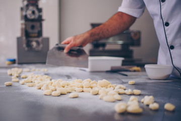 man working at fresh pasta factory