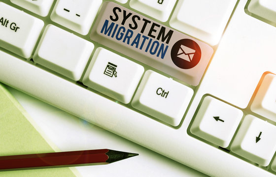 Writing note showing System Migration. Business concept for moving from the use of one operating environment to another