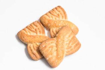 Cookies biscuits with sugar on top on white background in top view close up