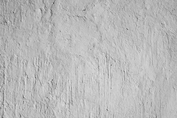 White background. White plastered wall, carelessly stained with paint.