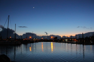 Fototapeta na wymiar Evening at Garibaldi Bay, Oregon, Crescent Moon in Sky