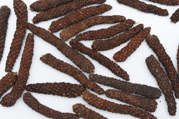 Long pepper or Piper longum on white background
Long black pepper (Also called as Pipli in Indian, capsicum frutescens, Balinese pepper, Jaborandi pepper, Bengal pepper, Dipli in Thai, Piper longum)