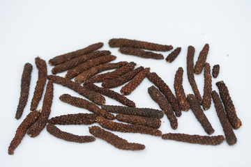 Long pepper or Piper longum on white background
Long black pepper (Also called as Pipli in Indian, capsicum frutescens, Balinese pepper, Jaborandi pepper, Bengal pepper, Dipli in Thai, Piper longum)