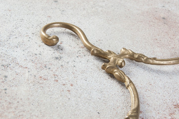 Obraz premium Antique brass clothes hanger