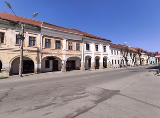 Fototapeta na wymiar Romania ,Bistrita ,2020,april, Liviu Rebreanu street and Central square ,Sugalete,empty city in quarantine,covid 19