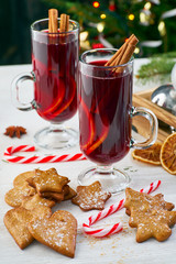 Two cups of mulled wine with Christmas decorations