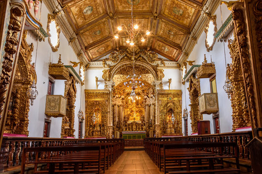 Interior and altar of historic church all painted in gold with baroque architecture in the old city of Tiradentes in Minas Gerais state, Brazil