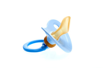 a blue pacifier for boy made of soft silicone  isolated on white background, nobody.