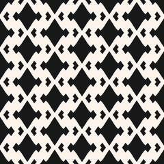 Vector geometric seamless pattern with rhombuses, diamond shapes. Argyle texture. Tribal ornament, folk motif. Simple black and white abstract background. Repeat design for textile, wallpaper, carpet