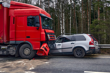 Fototapeta na wymiar Car after a collision with a heavy truck