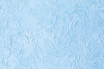 Luxury background with imitation of sea wave. Handmade. Texture of light blue plastered wall with glaze finish. Copy space