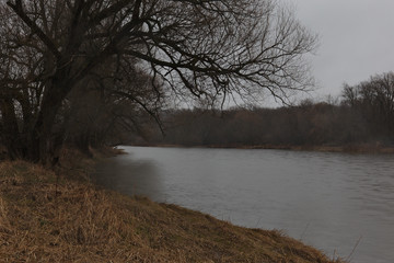 The Grand River during a heavy rain storm. Shot during early spring in Waterloo, Ontario, Canada.
