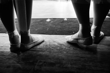 female legs in Czechs, dancers, black and white horizontal retro photo