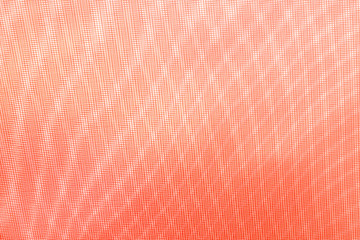 abstract background: unique wavy pattern of overlaying two grids, blurred and tinted to the color of the living coral