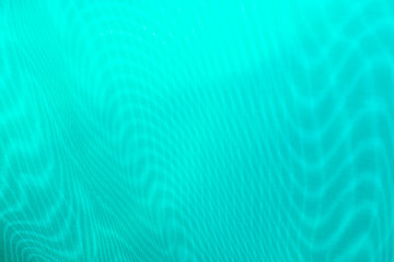 Fototapeta na wymiar abstract background: unique wavy overlay pattern of two grids, blur and tint in a light turquoise color