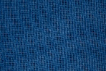 abstraction background: unique wavy pattern of overlaying two grids, blurry and tinted to classic blue