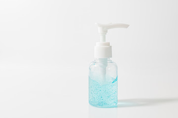 White pump bottle of hand sanitizer gel in  isolated on a white background. Sanitizer gel for corona virus or Covid 19 protection.