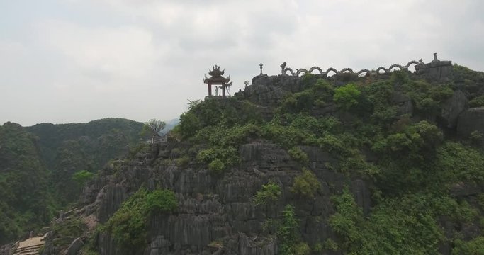 Aerial view of Tam Coc Bich Dong, part of the Trang An Scenic Landscape Complex UNESCO World Heritage site, Ninh Binh. Tam Coc is a flooded cave karst system, Bich Dong is a series of moutain pagodas