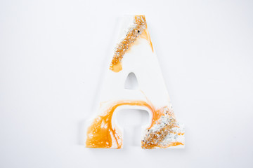 Obraz premium gold and white letter A