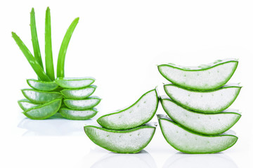Green fresh aloe vera leaf with slice isolated on white background. Natural herbal medicine plantskincare ,health and beauty spa concept. 