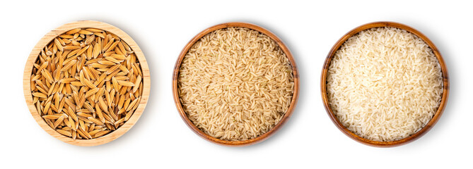 Brown rice ( milled rice imperfectly cleaned,unpolished or half milled rice) in wooden bowl isolated on white background with clipping path . Overhead view.