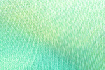 abstract background: unique wavy pattern of overlaying two grids, blurry and tinted to light emerald shades
