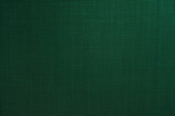 dark abstract background: unique wavy pattern of overlaying two grids, blurry and tinted green