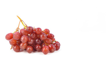 fresh red grapes isolated on white background.