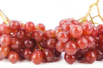 fresh red grapes isolated on white background.