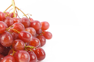 fresh red grapes isolated on white background.