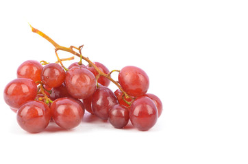 fresh red grapes isolated on white background.