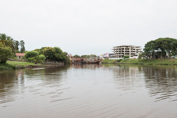 Fototapeta na wymiar Three boats crashed into the Carmelo swing bridge, in Las Vacas stream