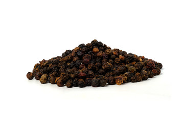 Black peppercorns isolated on white background