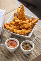 breaded chicken breast strips with dressings