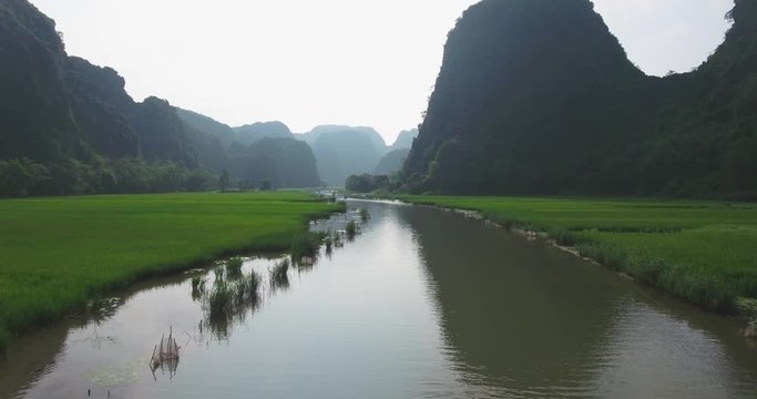 Aerial view of Tam Coc Bich Dong, part of the Trang An Scenic Landscape Complex UNESCO World Heritage site, Ninh Binh. Tam Coc is a flooded cave karst system, Bich Dong is a series of moutain pagodas