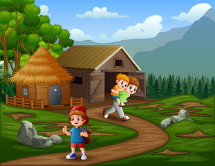 Happy boys playing in a cage farm