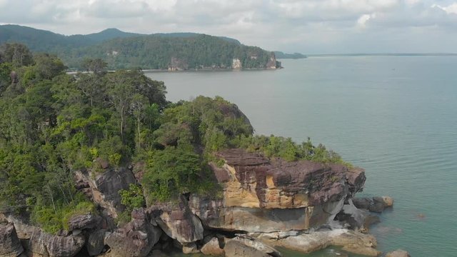 Aerial tilt shot on the shore rocks of Bako National Park, Kuching, Malaysia
