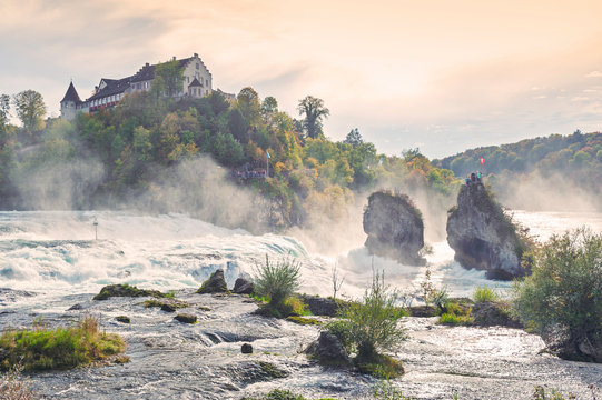 Mighty white rapids of the Rhine River at the Rhine Falls, the famous and biggest waterfall in Europe located in Schaffhausen, Switzerland