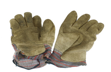old dirty gloves isolated on white background