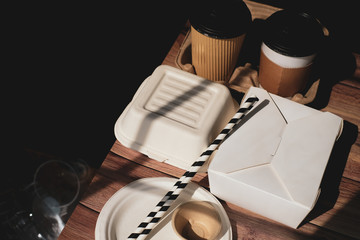 Eco friendly fast food and drink biodegradable containers from recycle paper . climate change and global warming to save environment.sustainability concept Top view