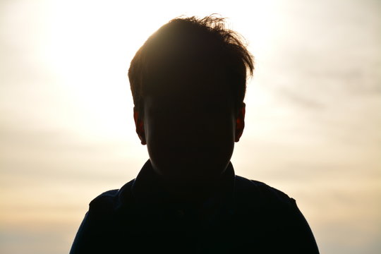 Close-up Of Silhouette Boy Against Sky