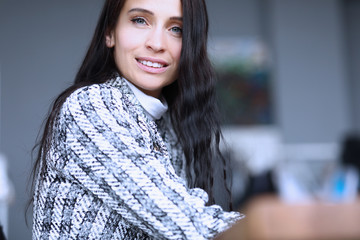 Young business woman expert smiling at workplace. Skills and qualities necessary for successful...