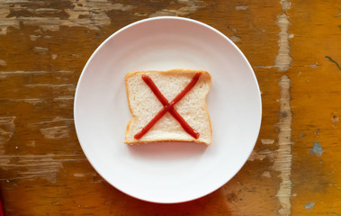 bread of breakfast is written X by ketchup on write plate. A to Z and Number and Special characters set.