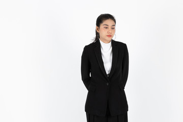 Obraz premium Tired sad Asian business woman suffering from severe depression standing over white isolated background. Unemployment and layoff concept.