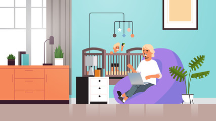 father freelancer working at home using laptop little son playing with toys in crib freelance coronavirus quarantine concept living room interior horizontal full length vector illustration