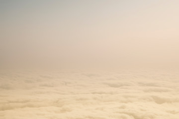 Fototapeta na wymiar over the clouds soft pastel panorama