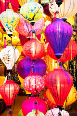 Fototapeta na wymiar Paper lanterns on the streets of old Asian town, Hoi An, Vietnam