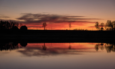 beautiful sunset by the lake, bright colors