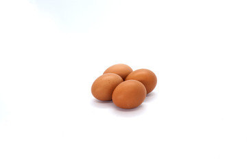 Four eggs isolated on white background