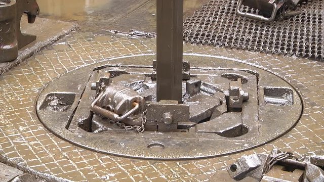 Slip on the rotary table while drilling oil well and pipe being rotated - Top View. rotor and drill tong of the drilling site working platform
